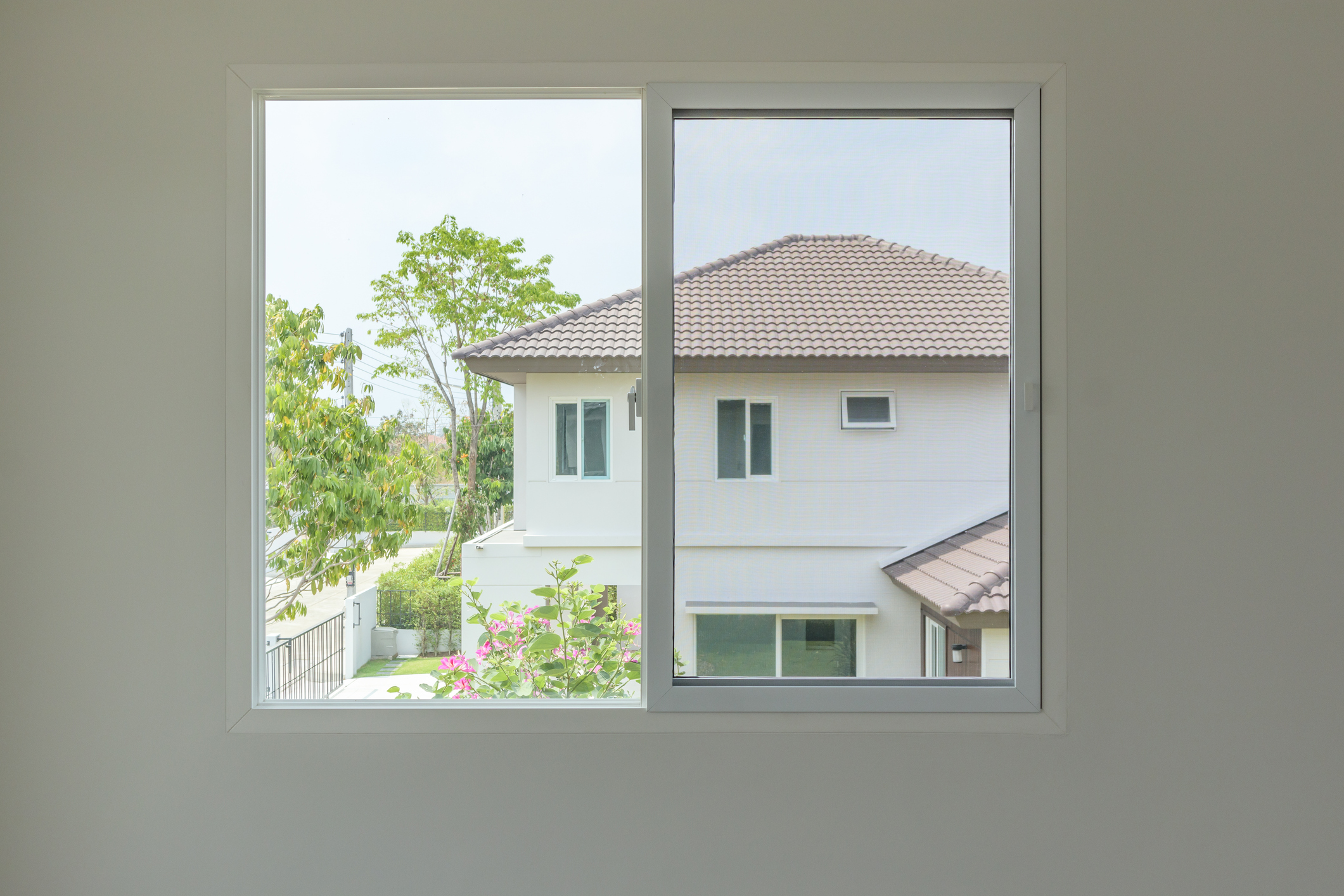 Glass window frame house interior on white wall Glass window frame house interior on white wall